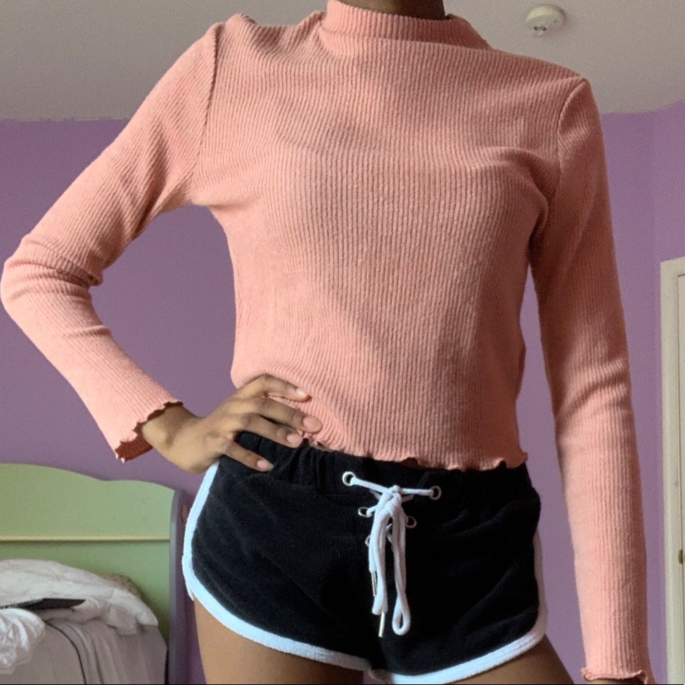 blush pink mock neck with lettuce cut